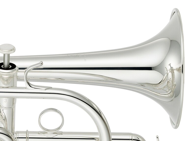 Campana de latón dorado